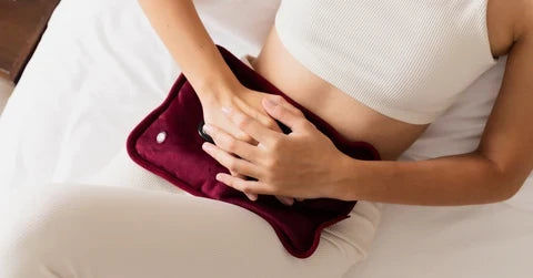 Kan brug af en menstruationskop hjælpe mod menstruationssmerter?