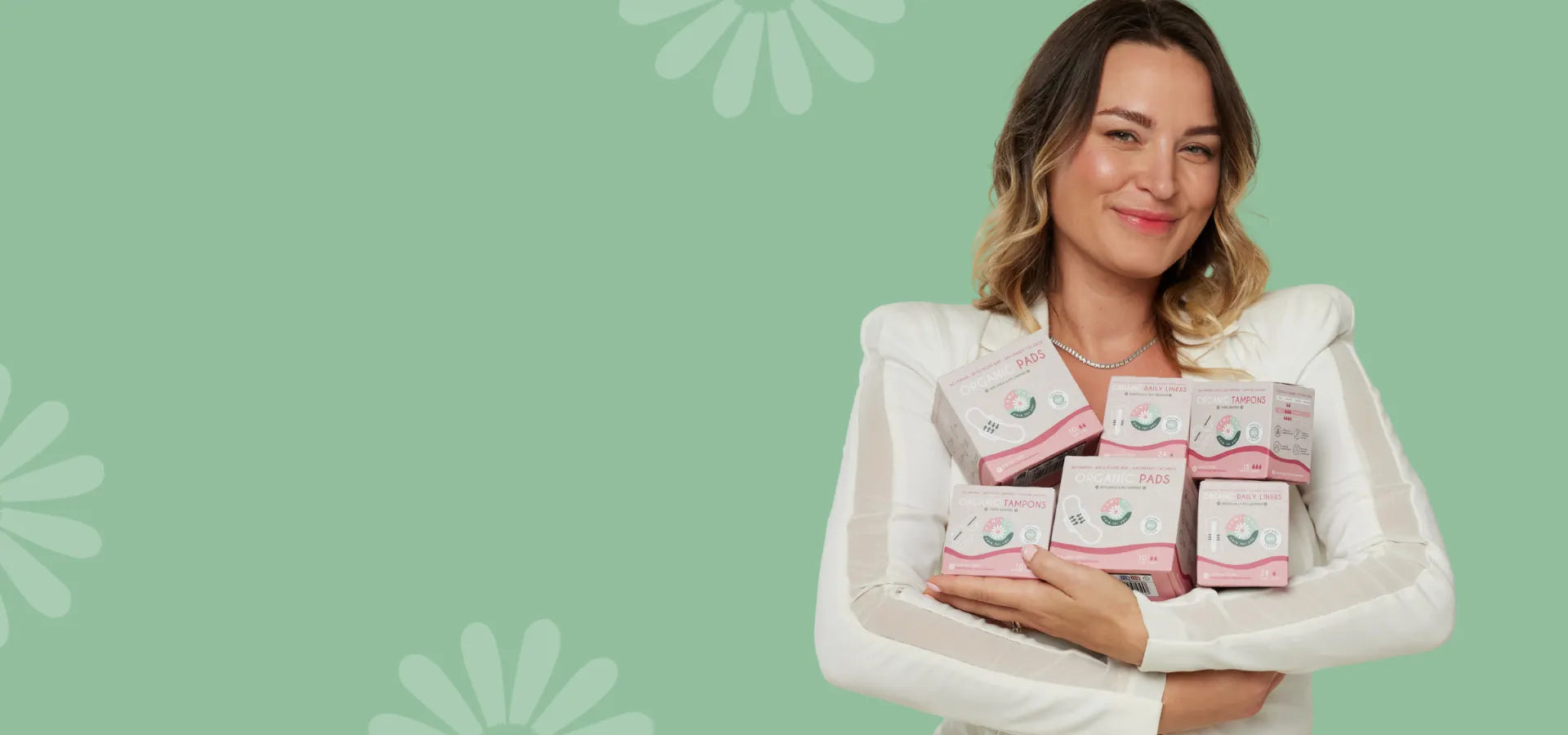 Narcisa, founder of Femieko, with the brand's products