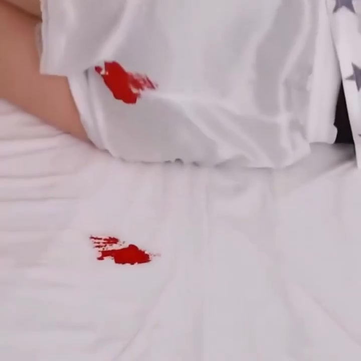 Menstrual stain on a white sheet
